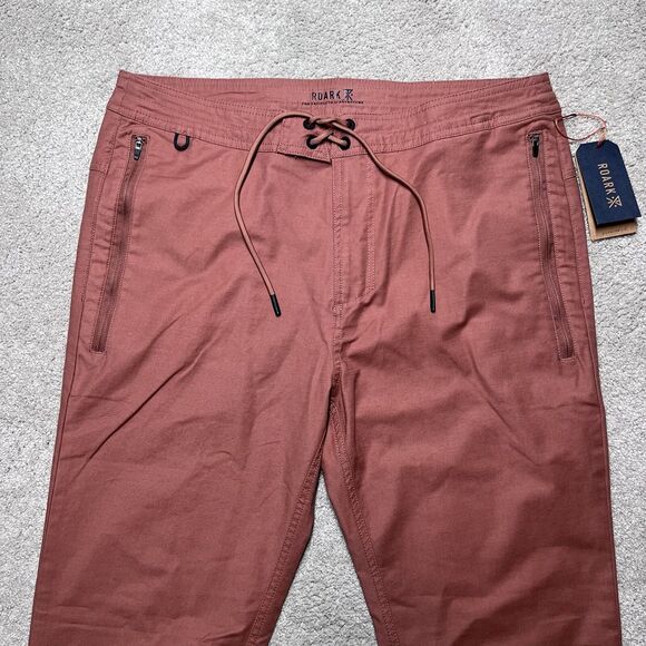 NWT Roark Layover 2.0 Travel Utility Pants Mens 33 Russet Orange Commuter Hiking - Picture 2 of 16
